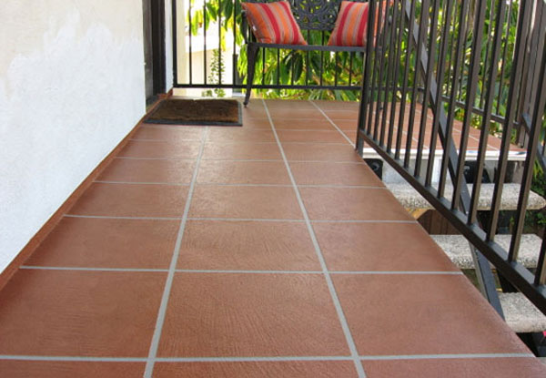 Deck finished in a tile-pattern coating